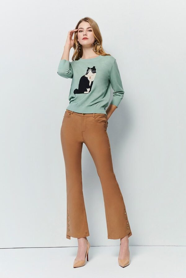 Flared pants with asymmetrical hem breasted