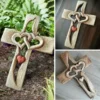 Carved wooden cross - intertwined hearts